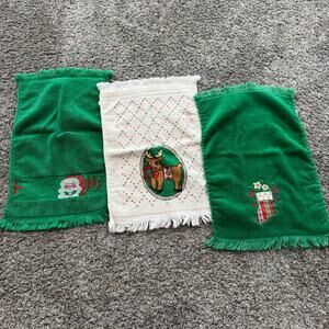 LOT of 3 Christmas Themed Hand Towels Reindeer Santa Claus Stocking & Poinsettia